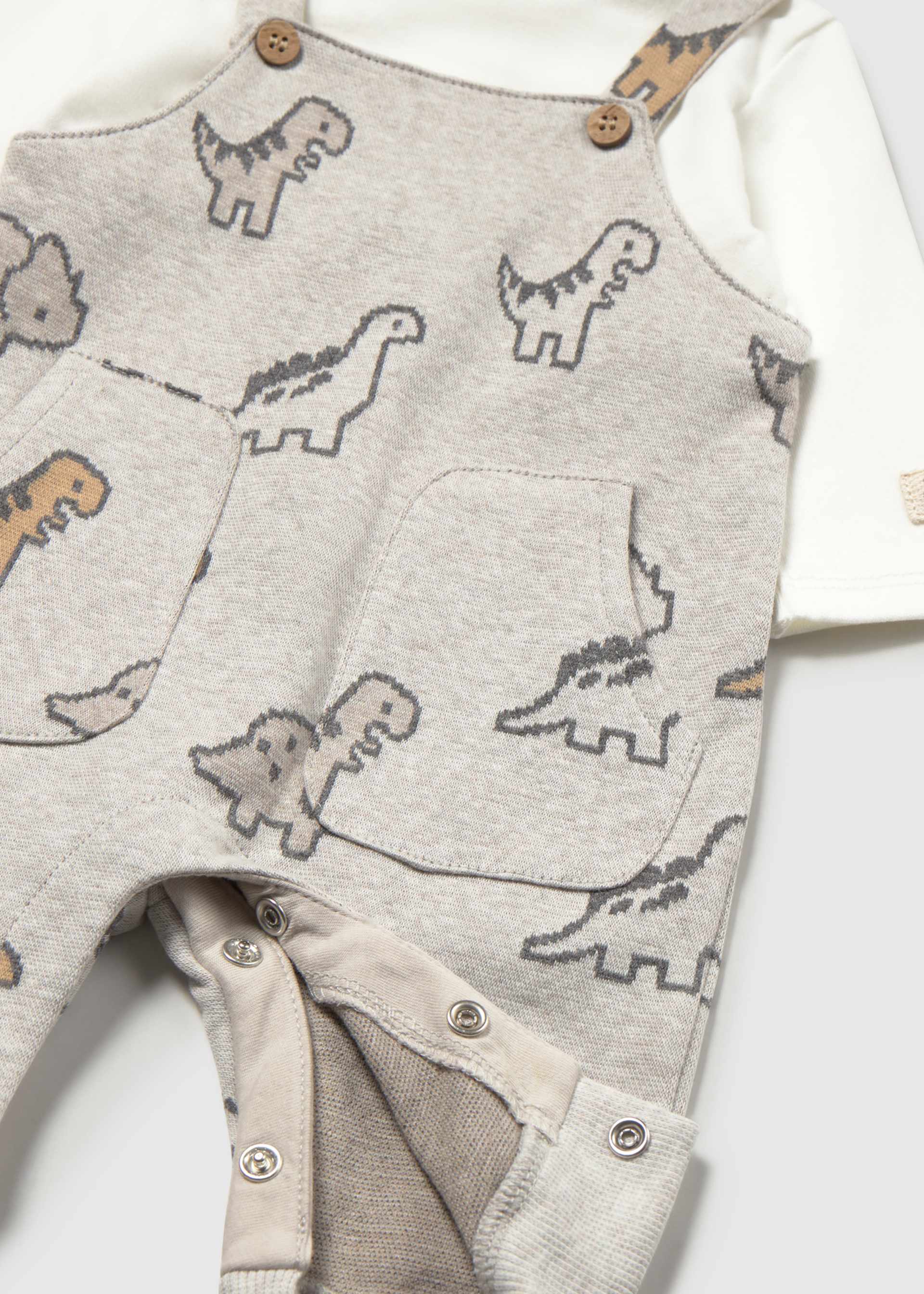 Newborn dinosaur dungarees