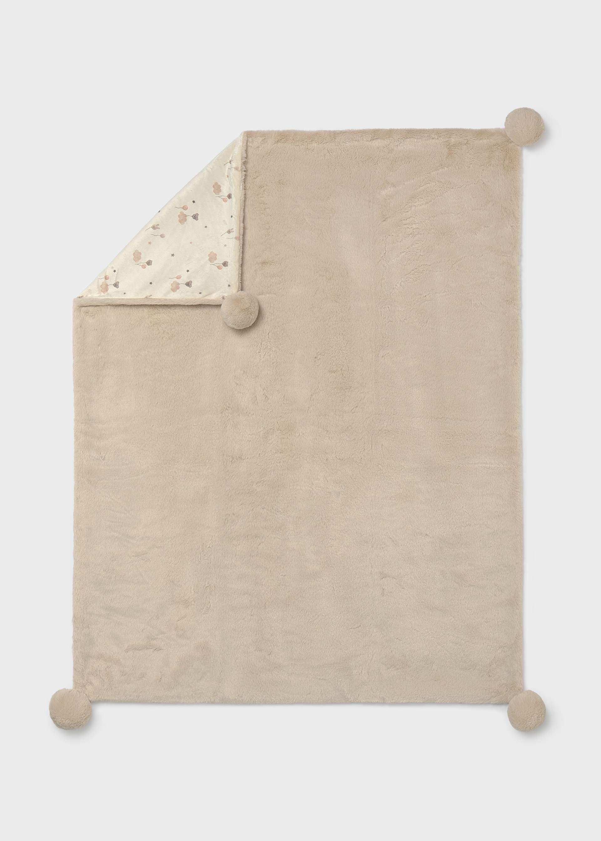 Baby blanket with pom-poms
