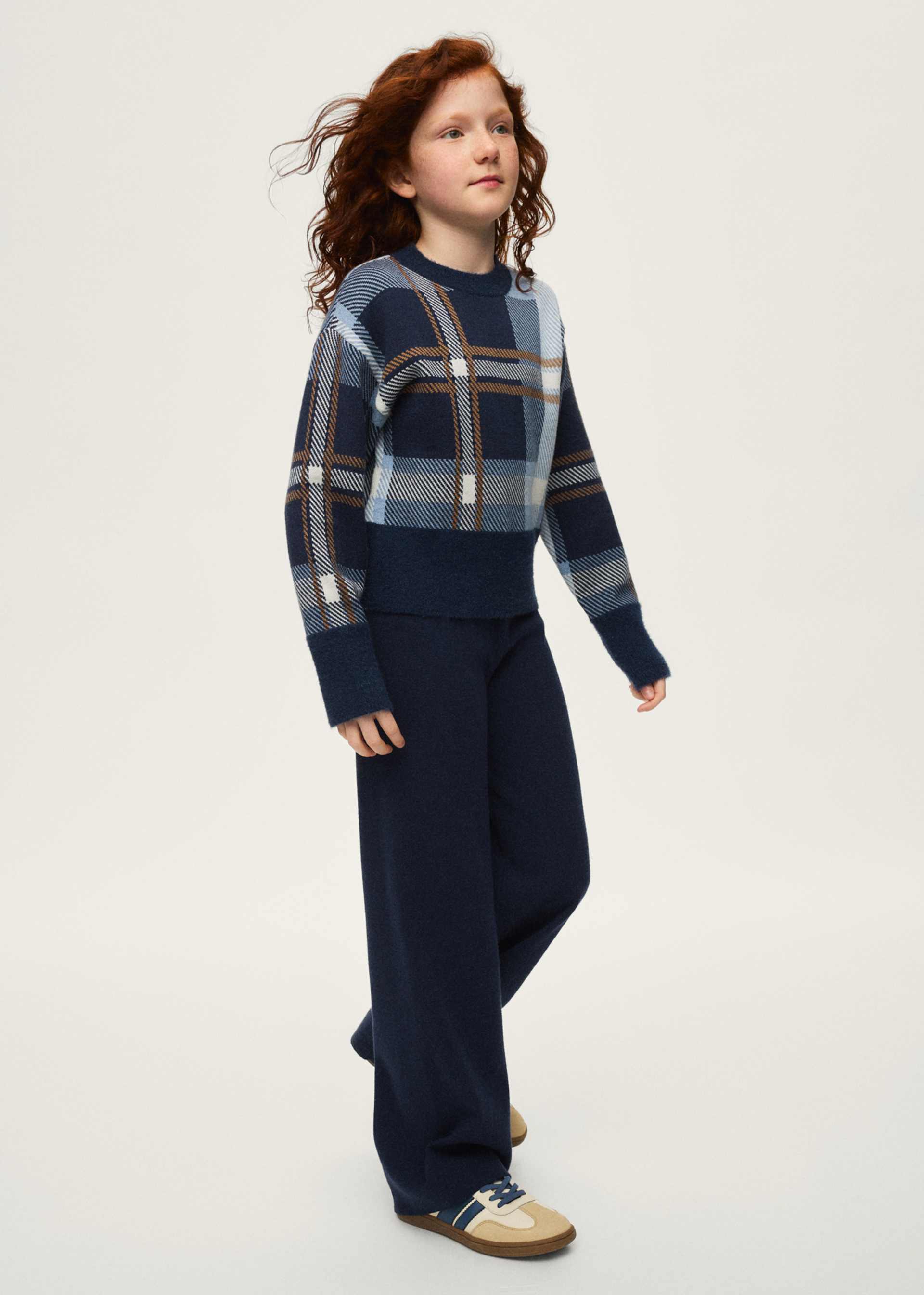 Conjunto pantalón y suéter chica