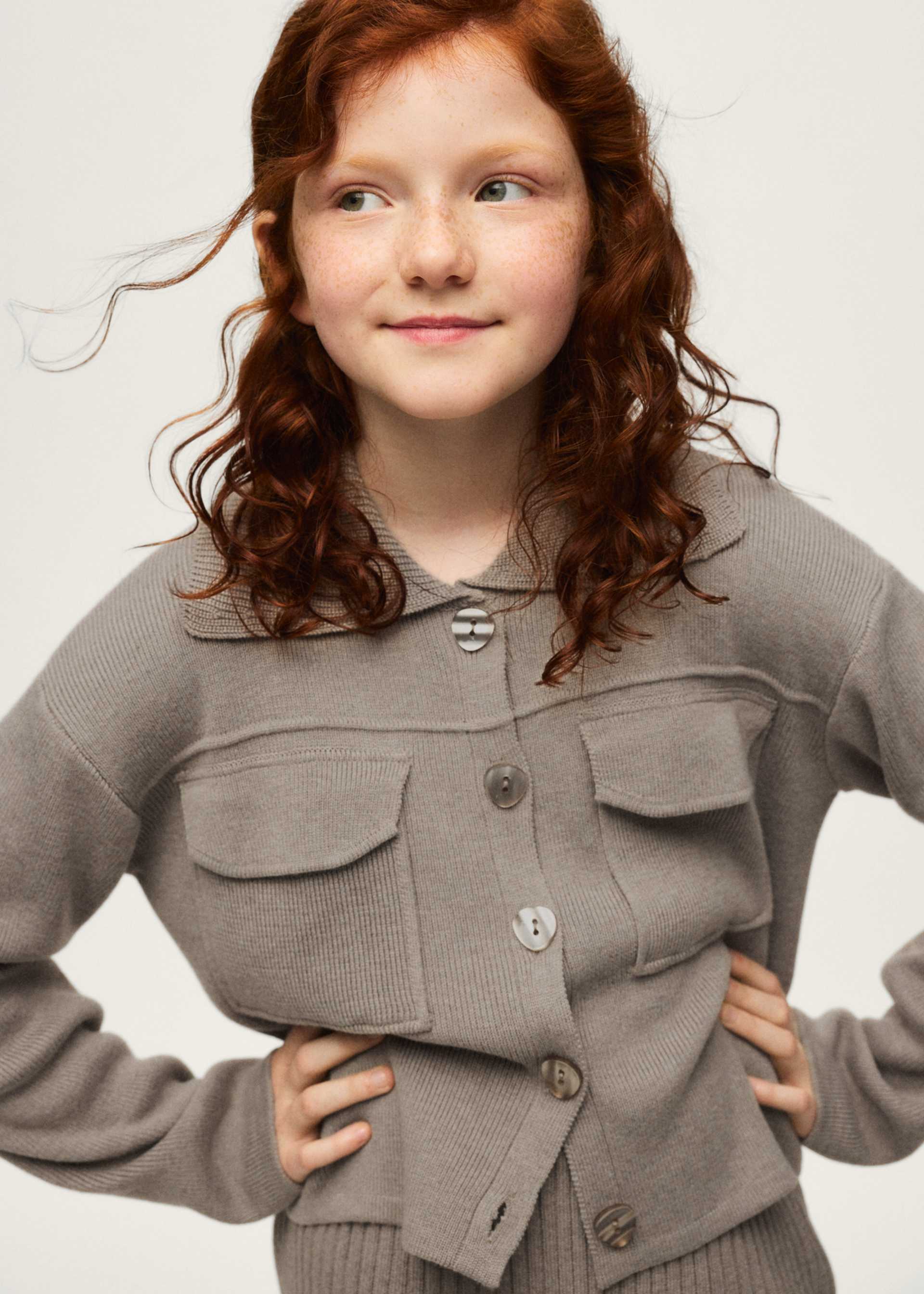 Chaqueta tricot bolsillos chica