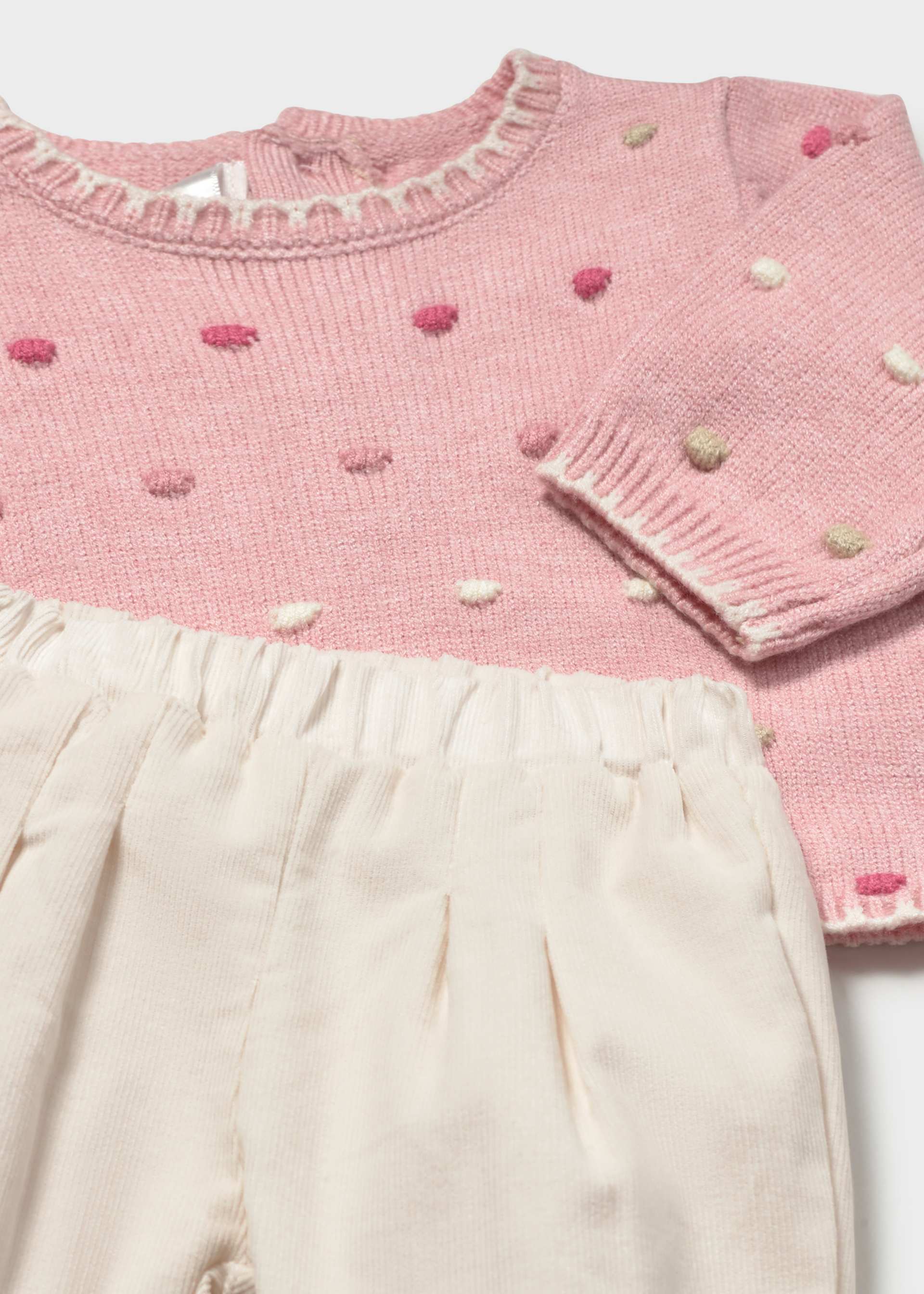Newborn girl jumper and trousers set