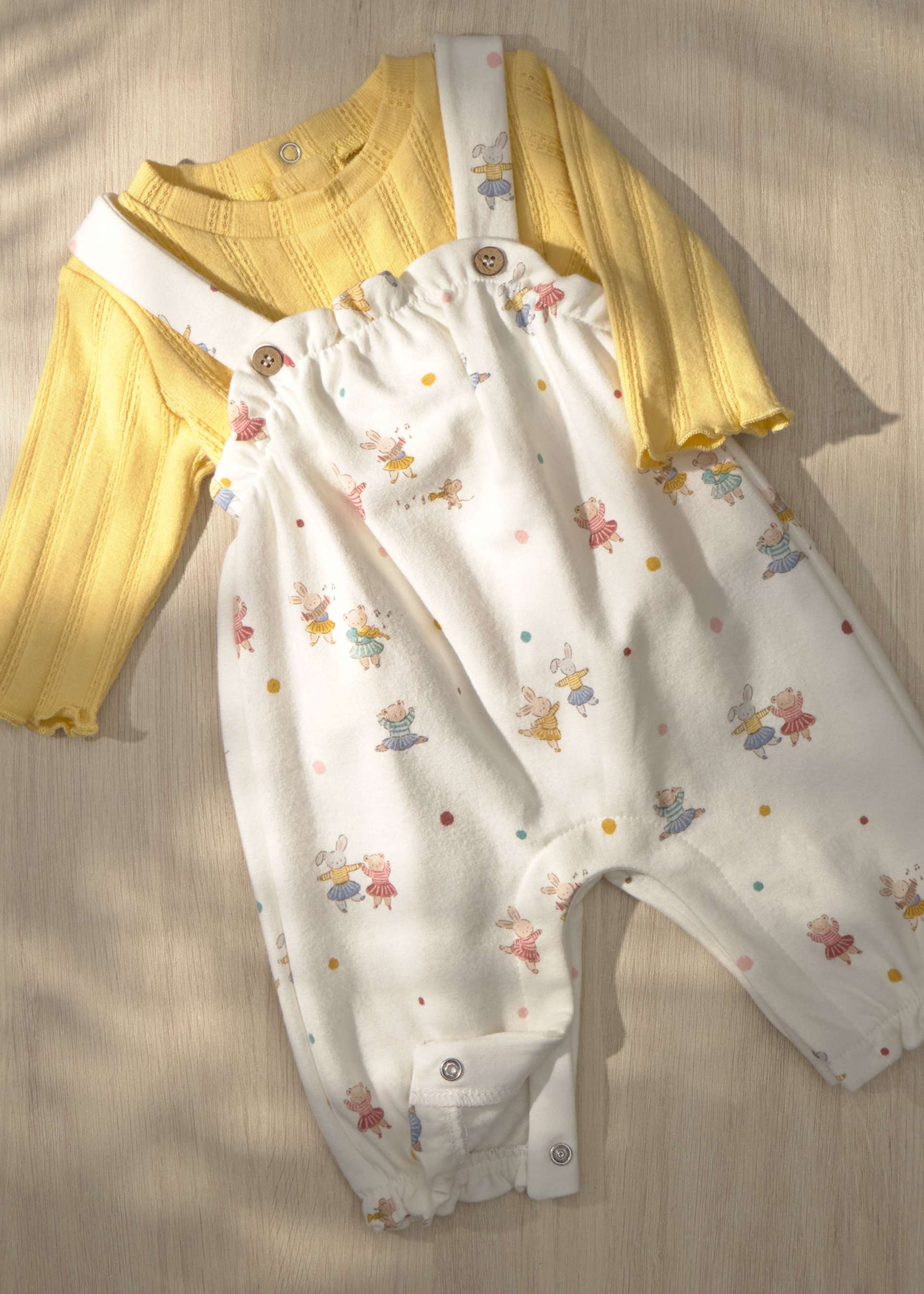 Newborn girl print dungarees and jumper set