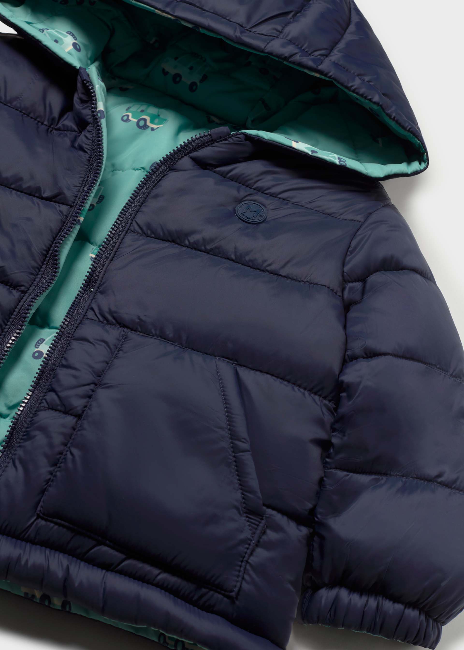 Manteau doux réversible avec motifs bébé