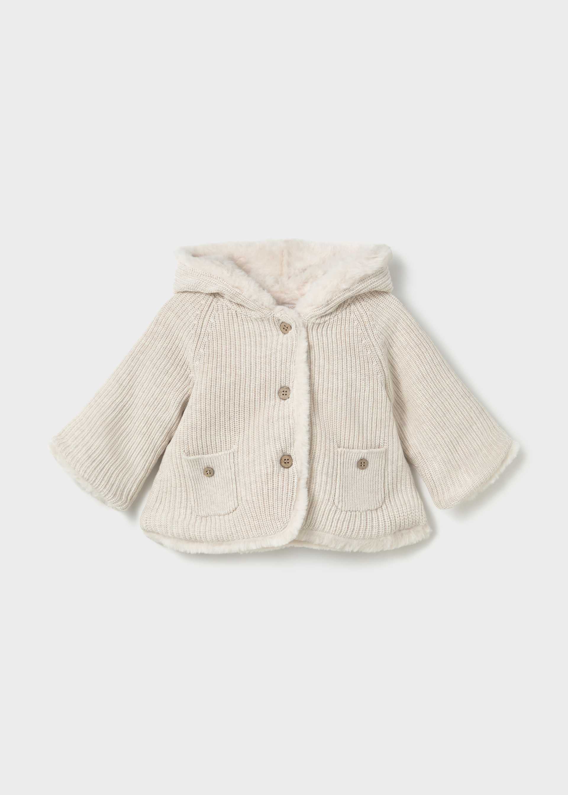 Cardigan à pompons nouveau-né