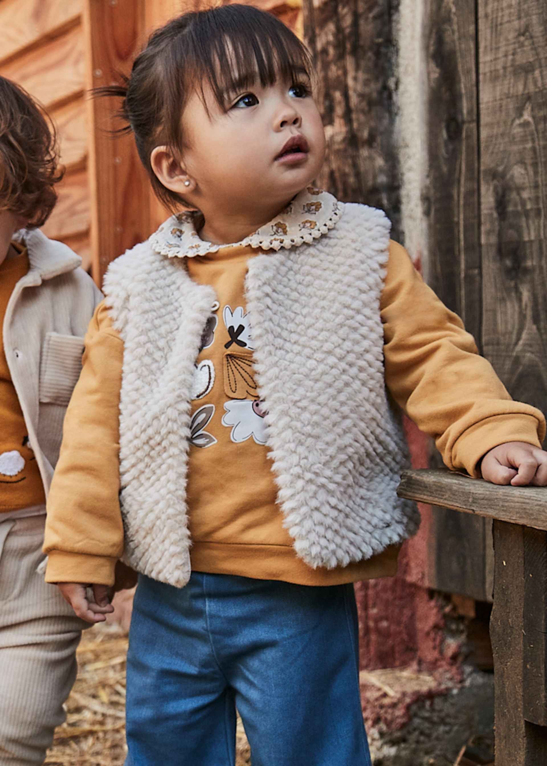 Gilet pellicciotto neonata