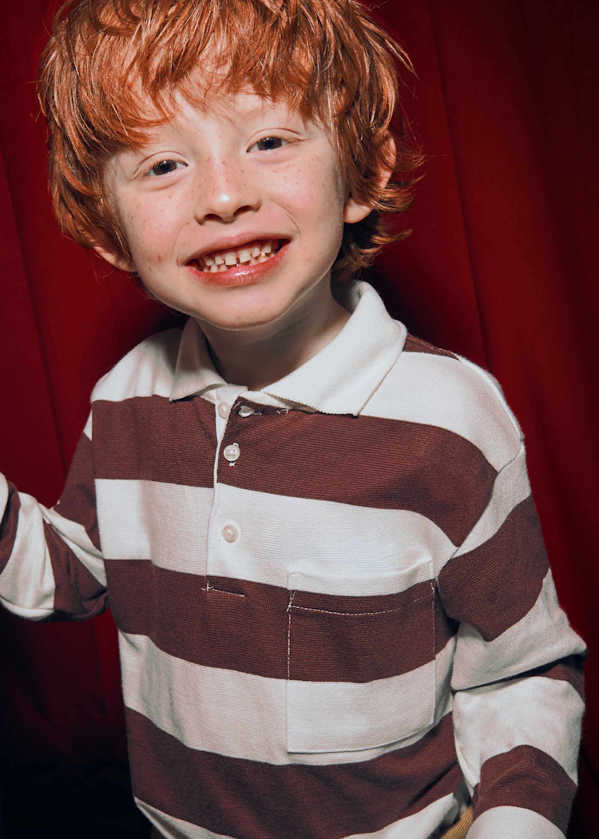 Boys long sleeved striped polo shirt