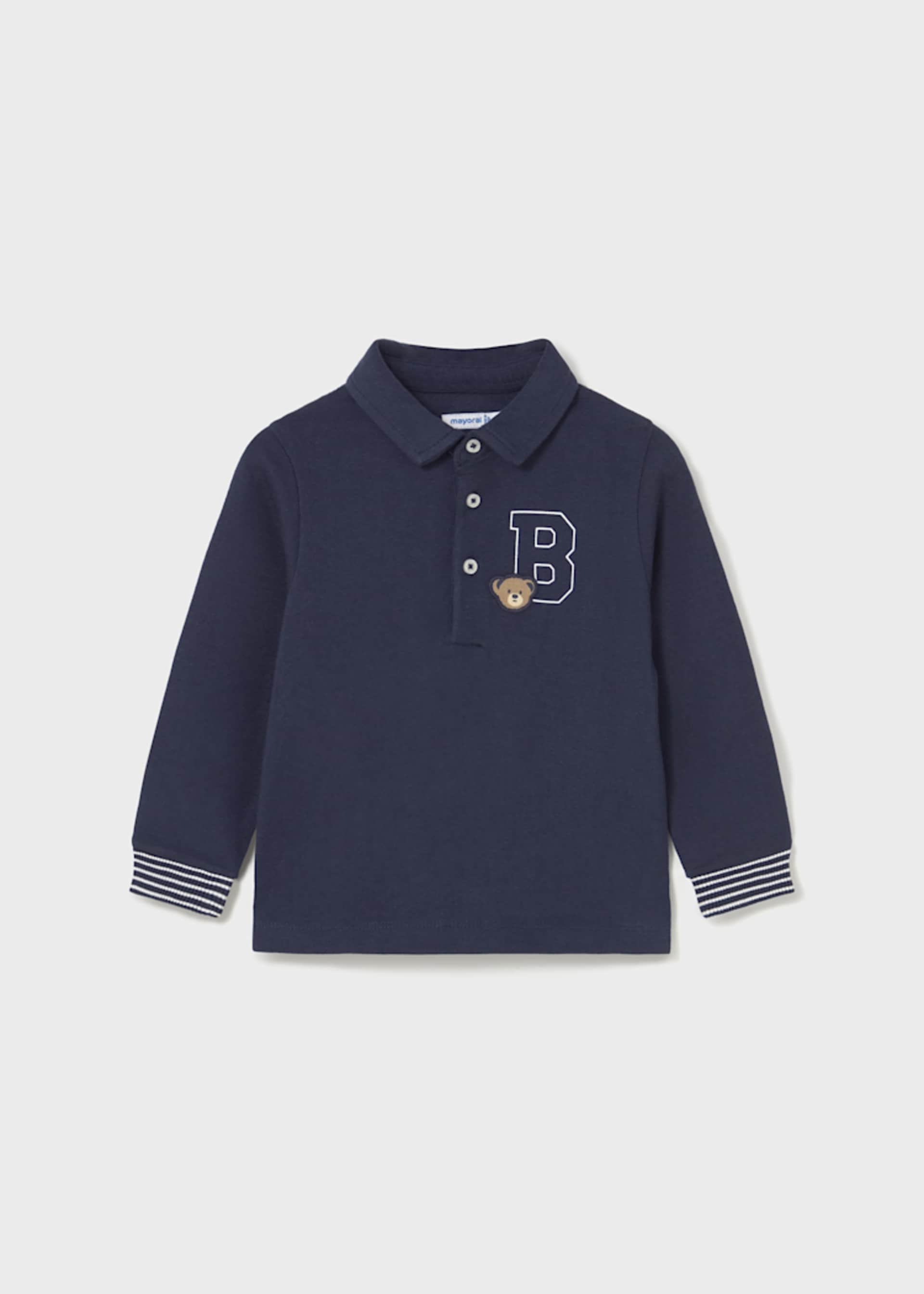 Polo uni avec détails bébé