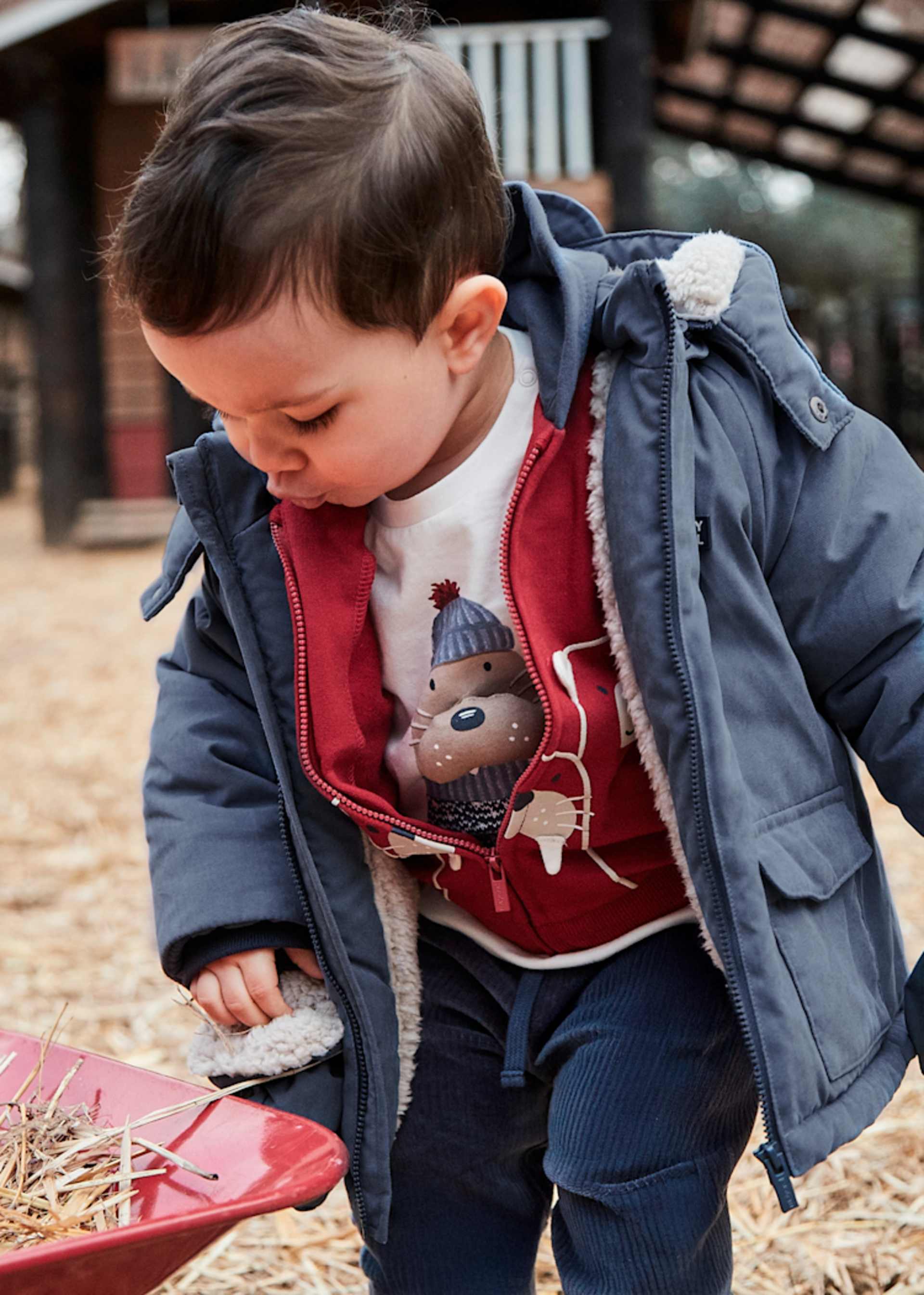 Manteau avec moufles bébé