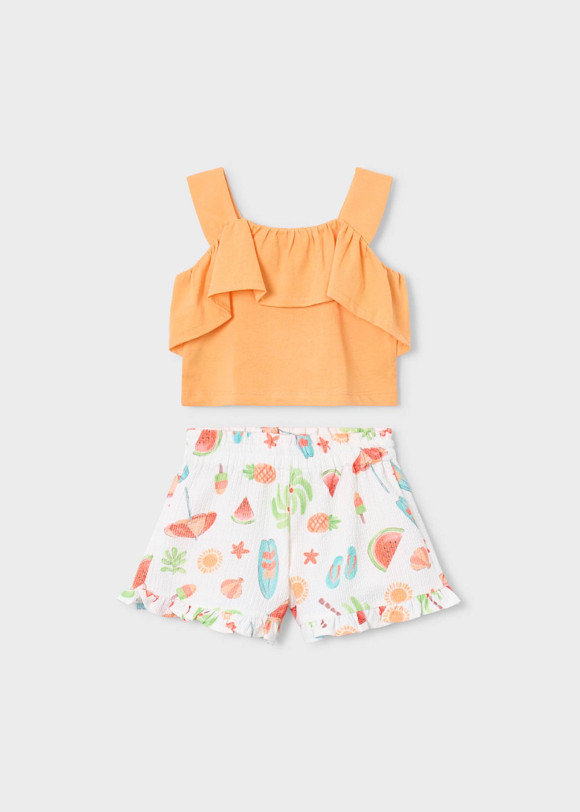 Completo shorts stampato e top con volant bambina