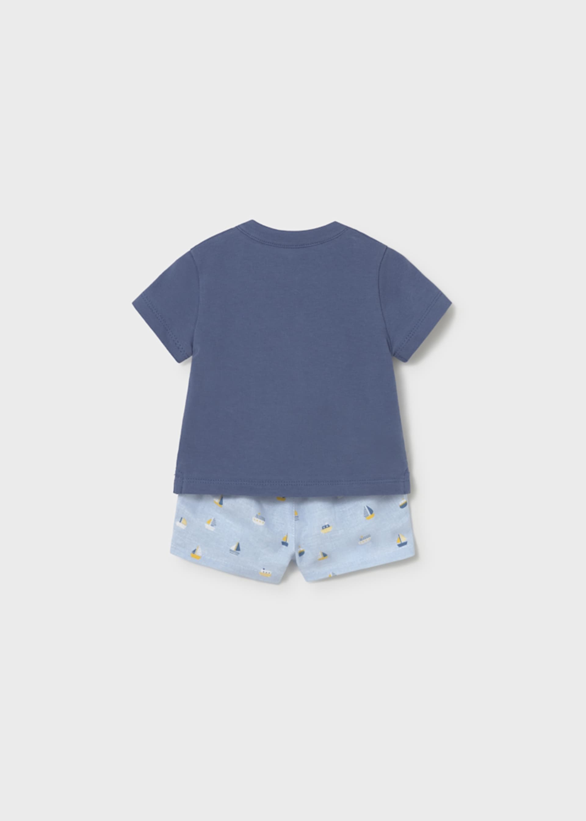 Conjunto calção estampado e polo recém-nascido