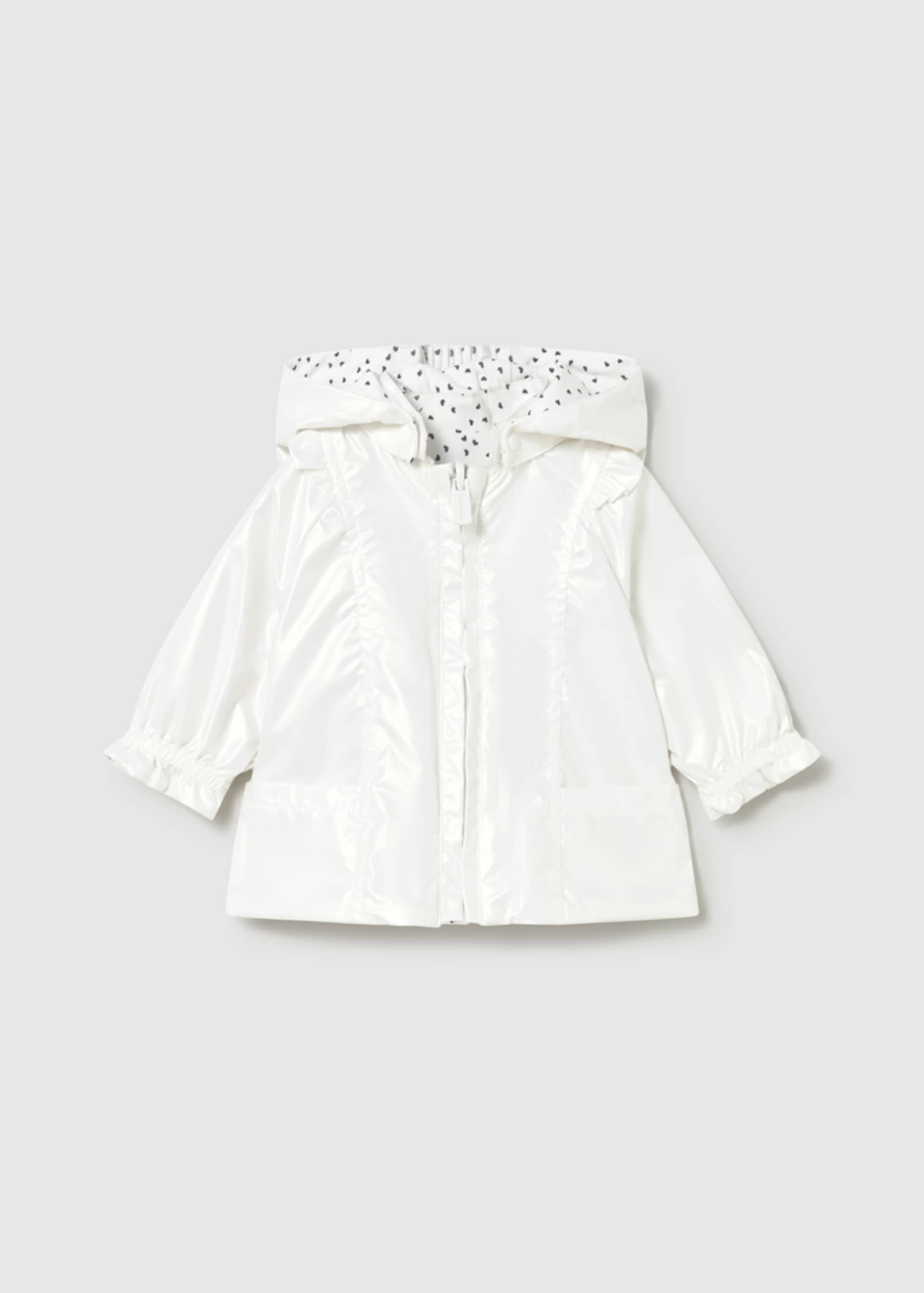 Reversible windbreaker for newborns