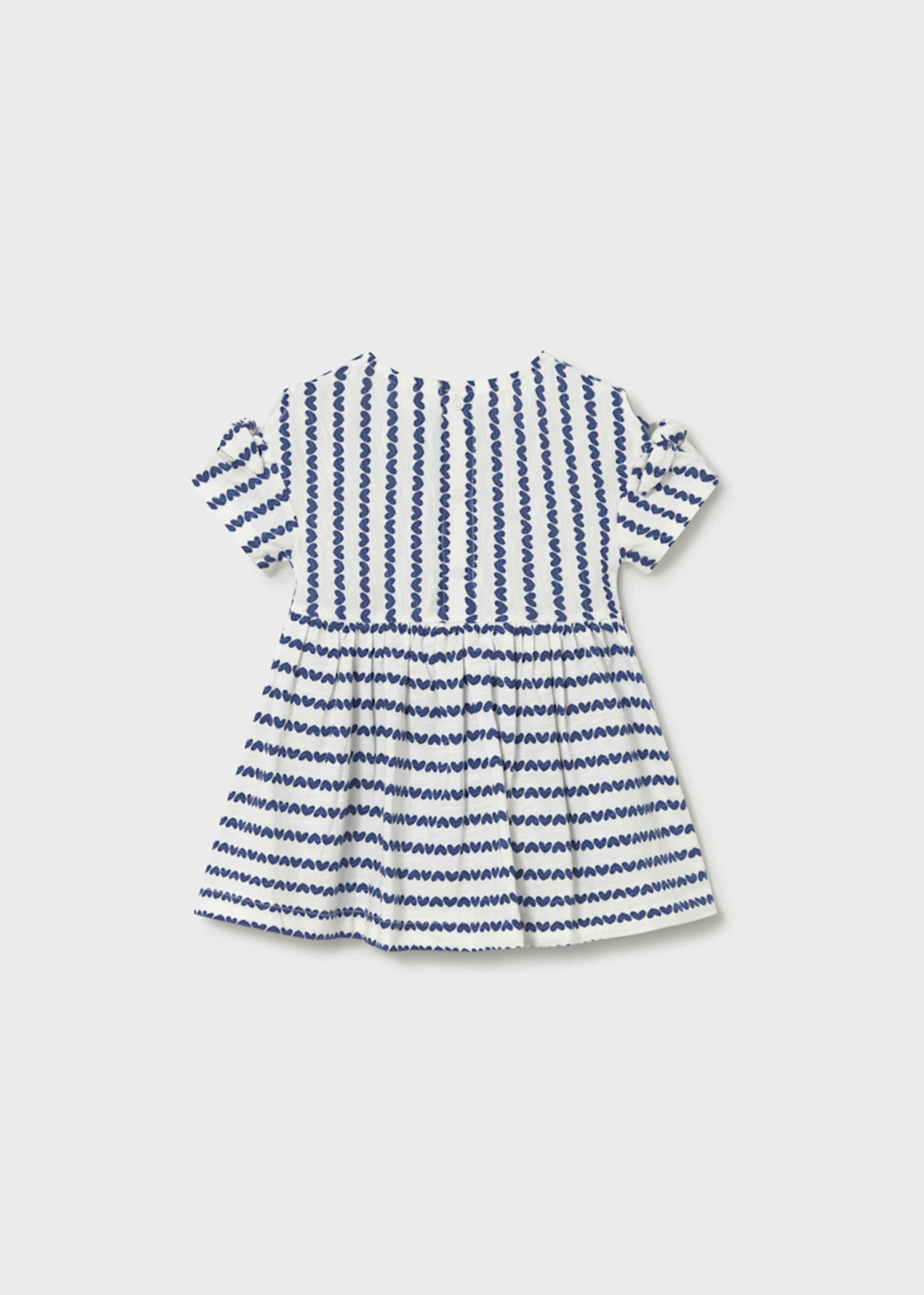 Vestido estampado con bolso bebé