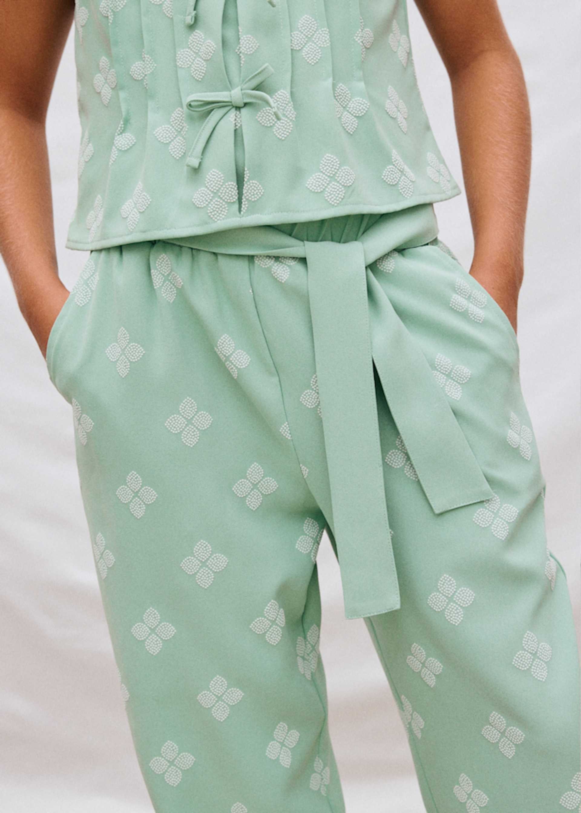 Pantalón largo estampado chica