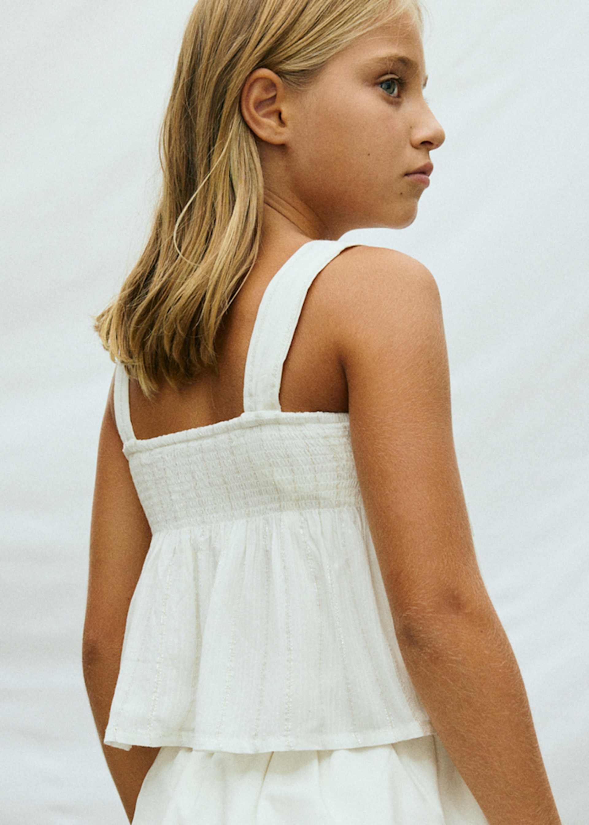 Top à fil métallisé nœud fille