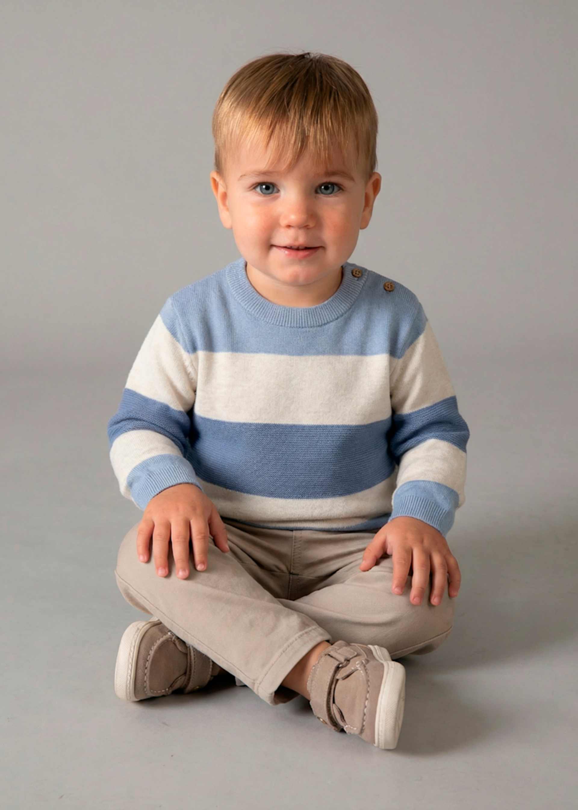 Baby knitted jumper with stripes