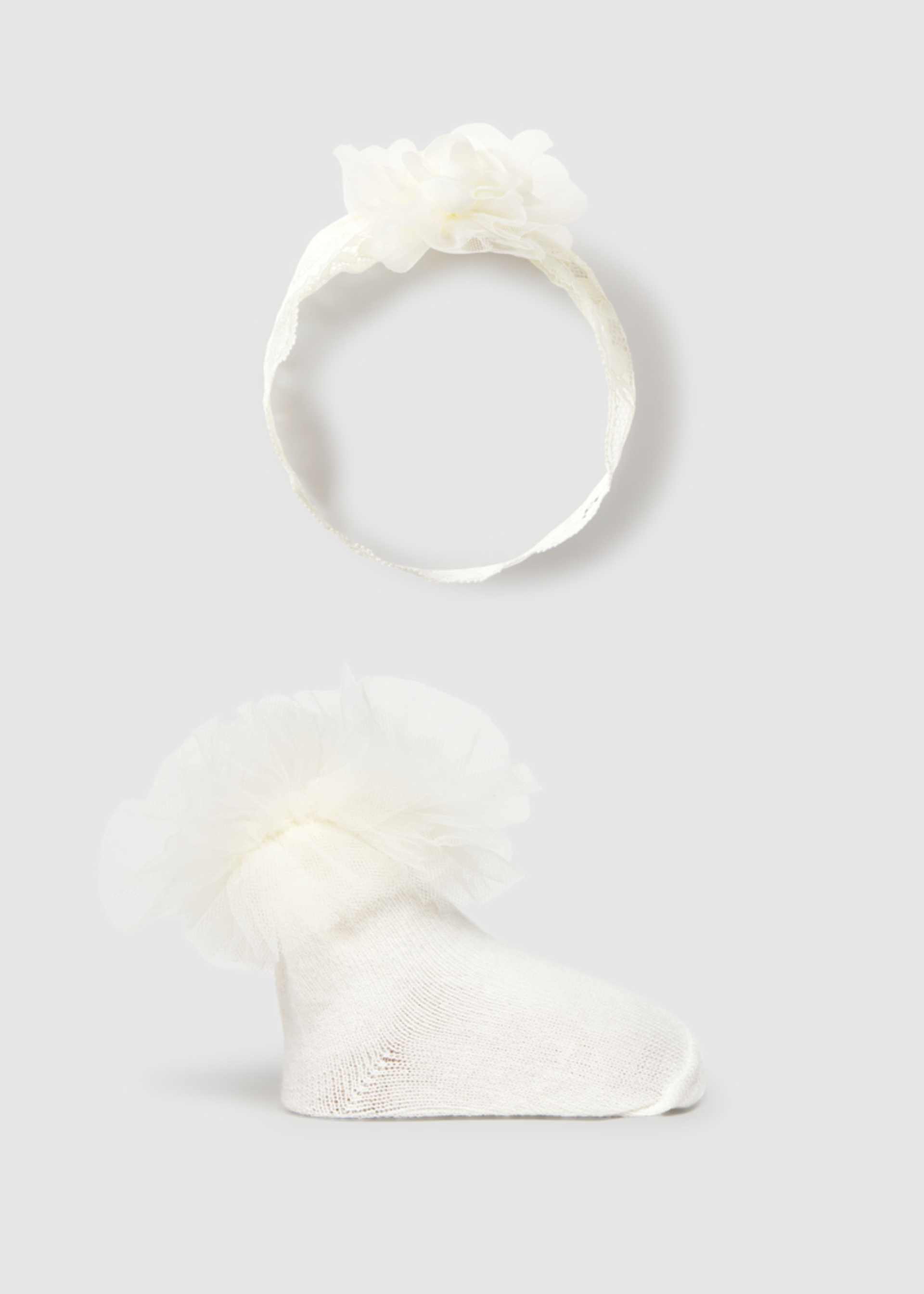 Set diadema y calcetines recién nacida