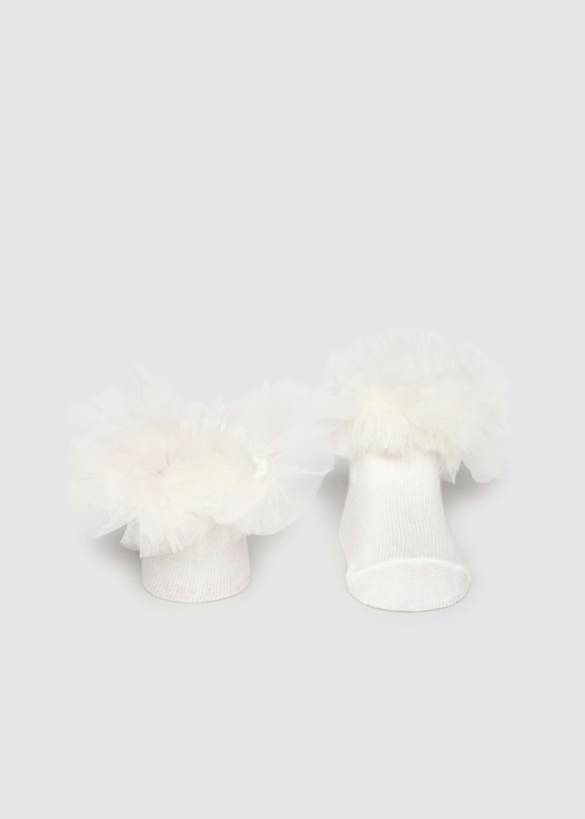 Lot serre-tête et chaussettes nouveau-né