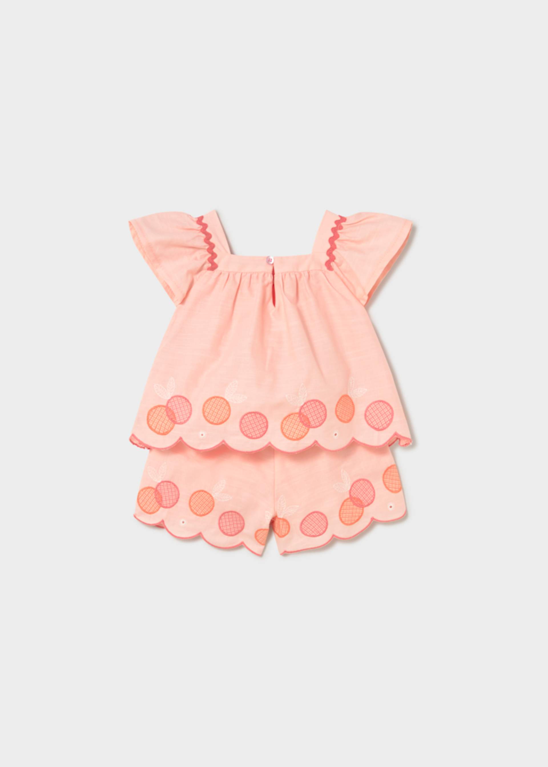 Completo con bermuda e blusa ricamata neonata