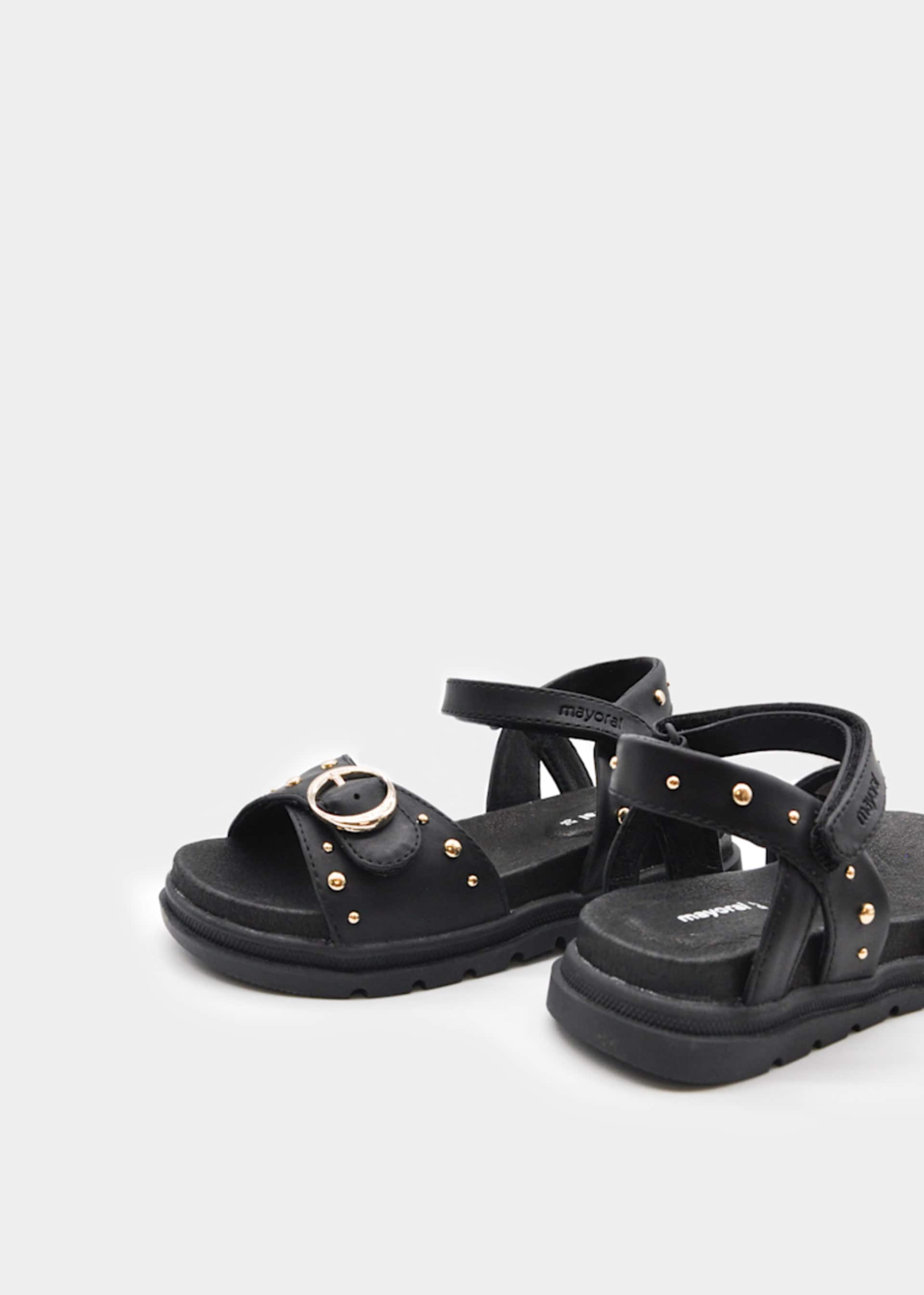 Studded sandals girl