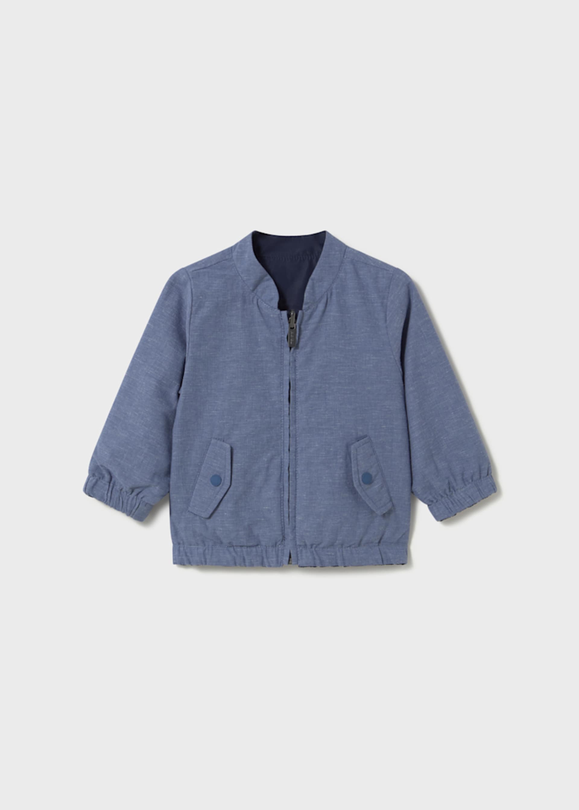 Reversible jacket with pockets