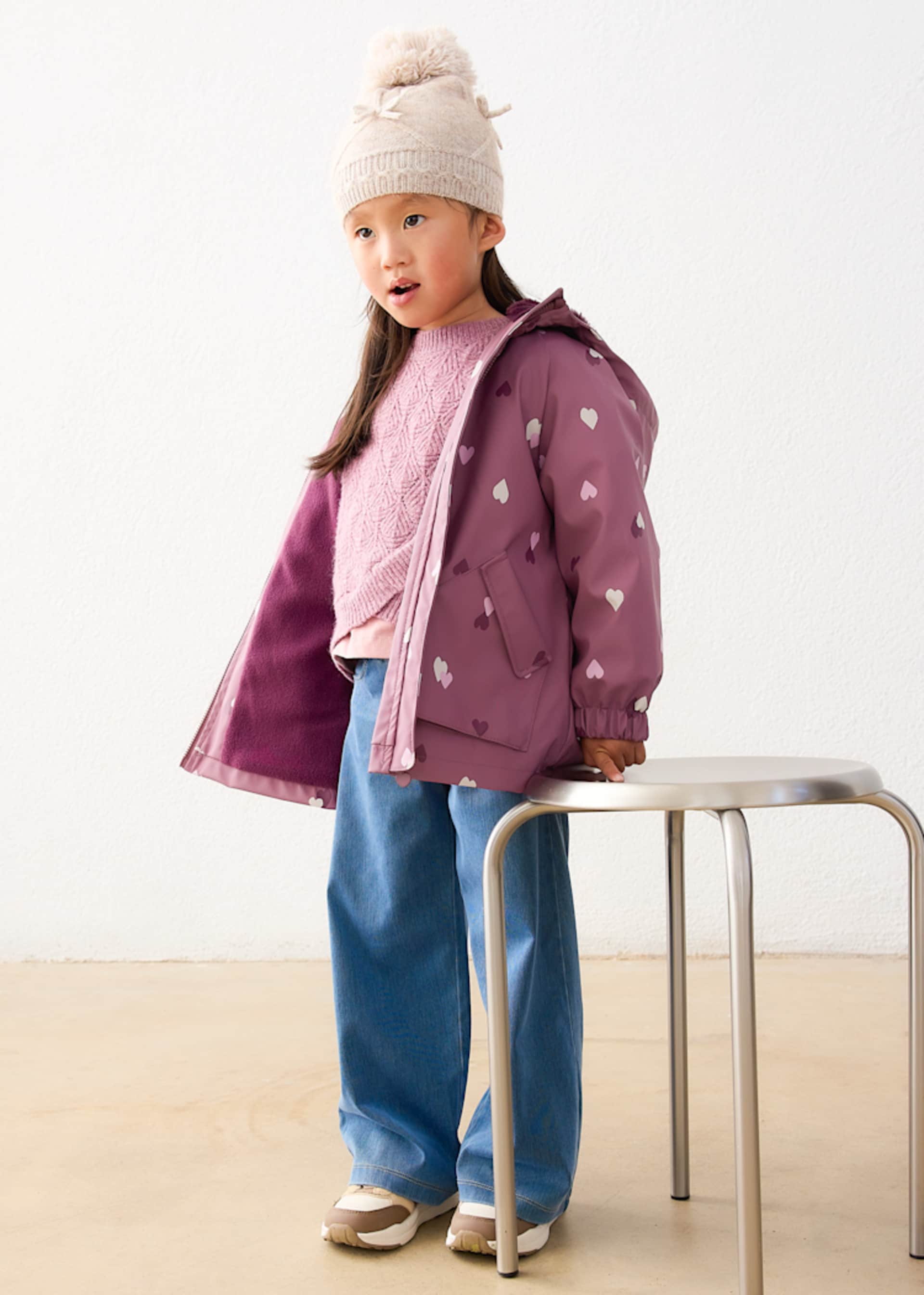 Girls' hooded rain jacket with fur trim