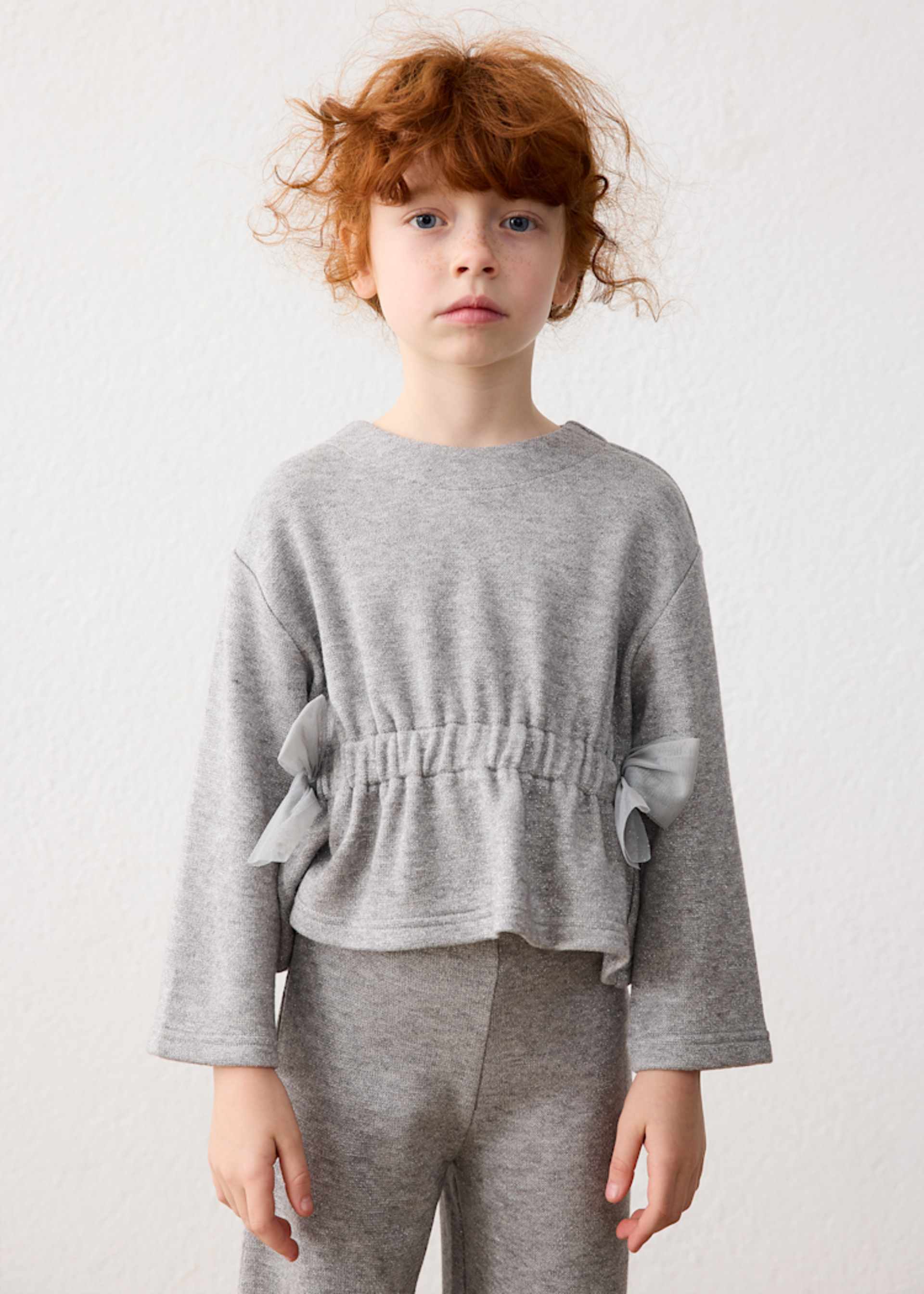 Ensemble pantalon et pull à nœuds fille