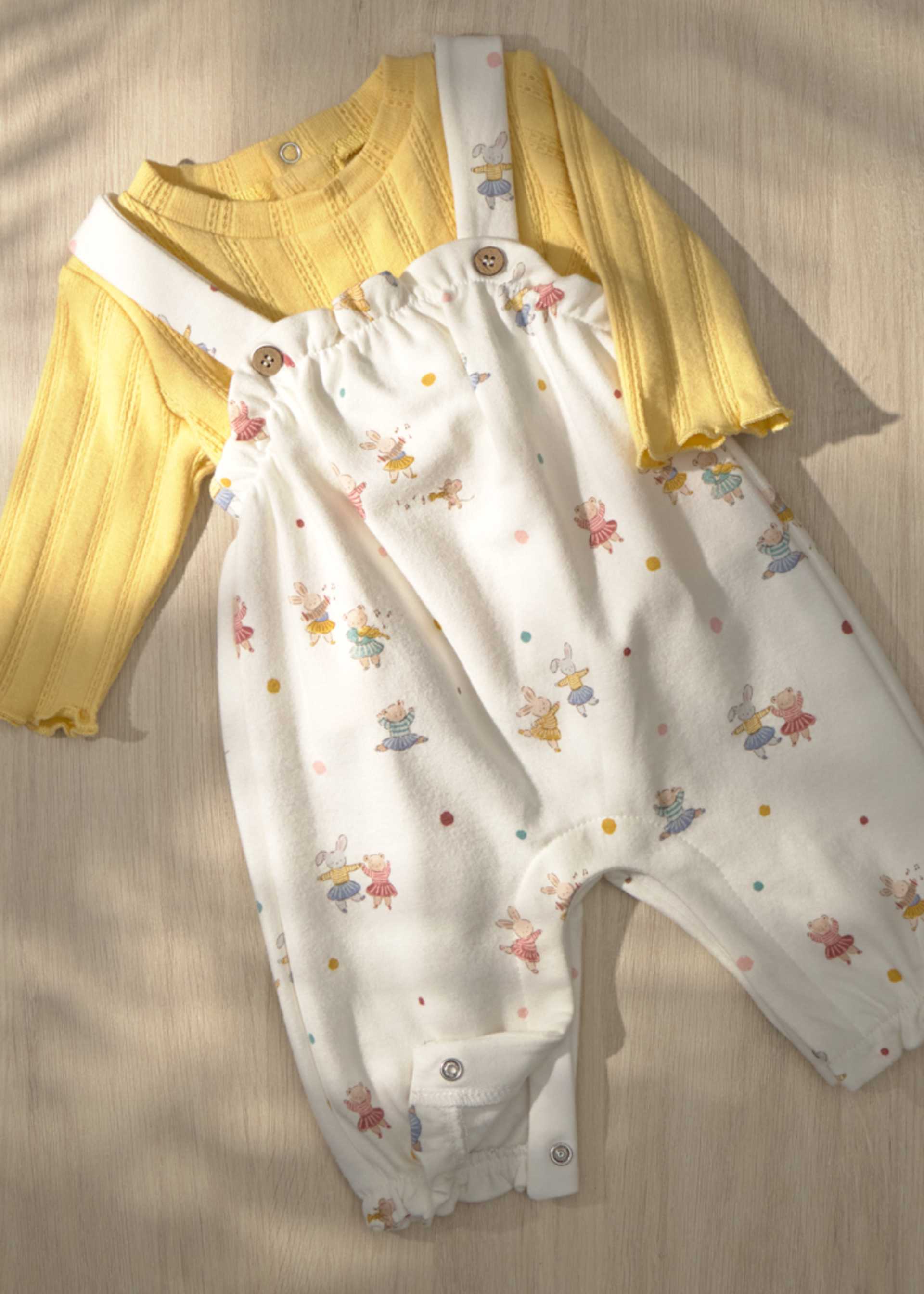 Newborn girl print dungarees and jumper set