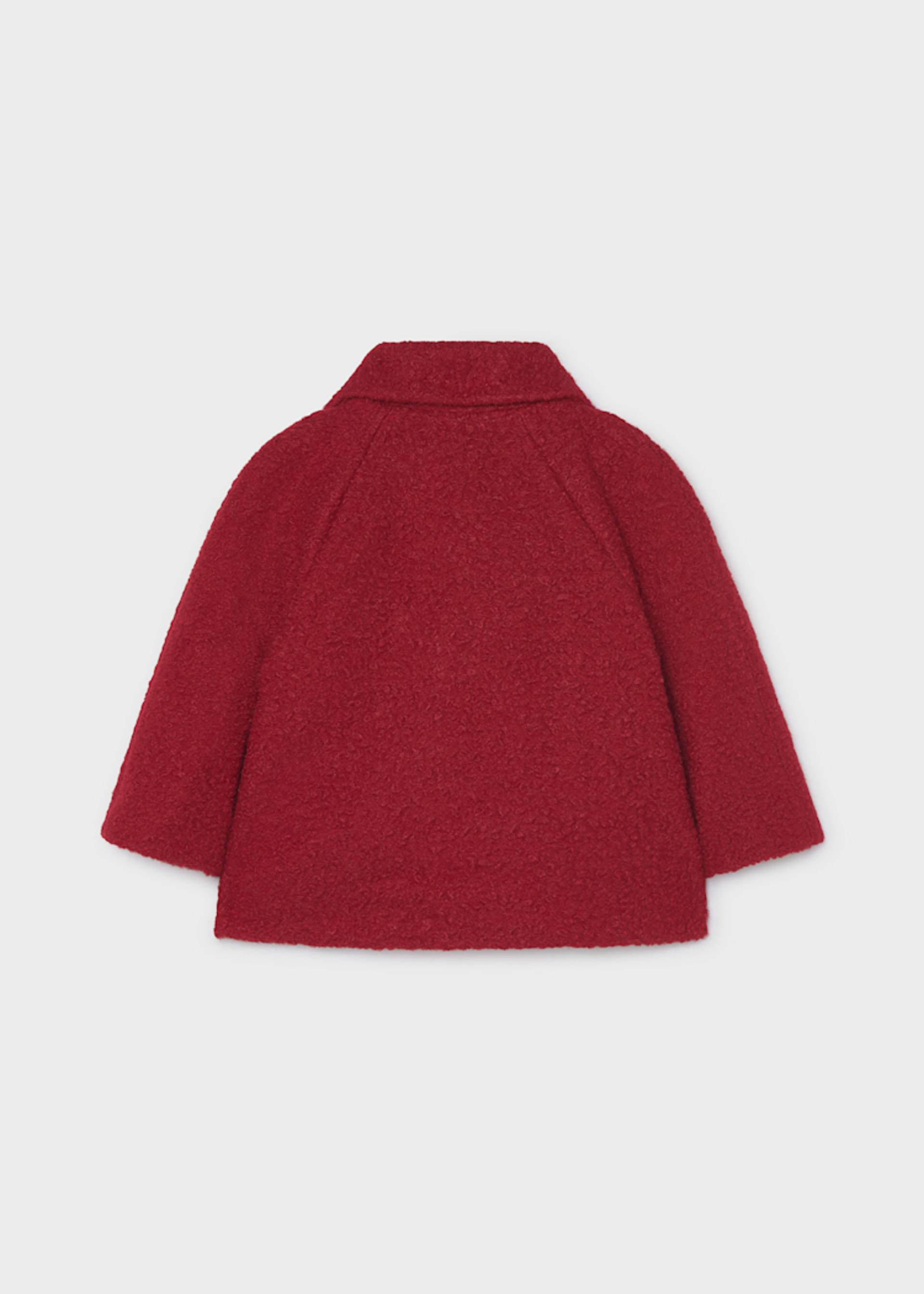 Manteau en laine bouclée avec sac