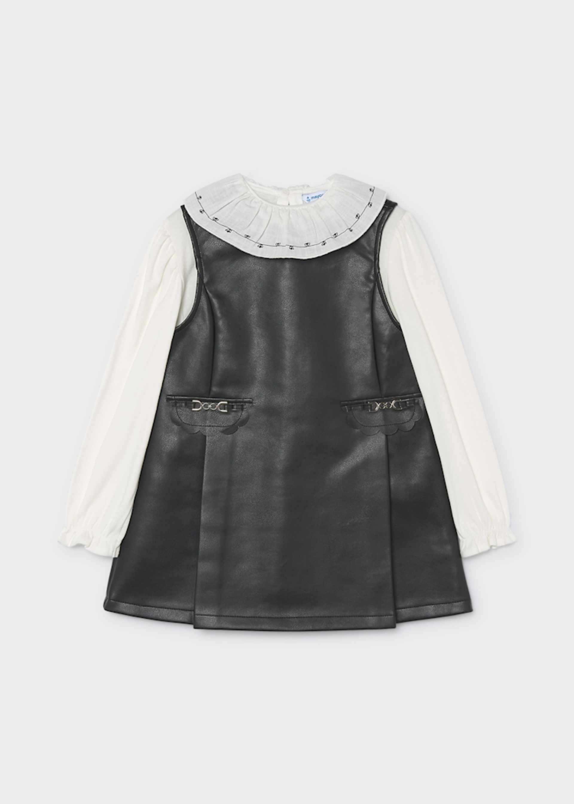Faux leather dress with a girl's blouse Faux leather dress with a girl's blouse