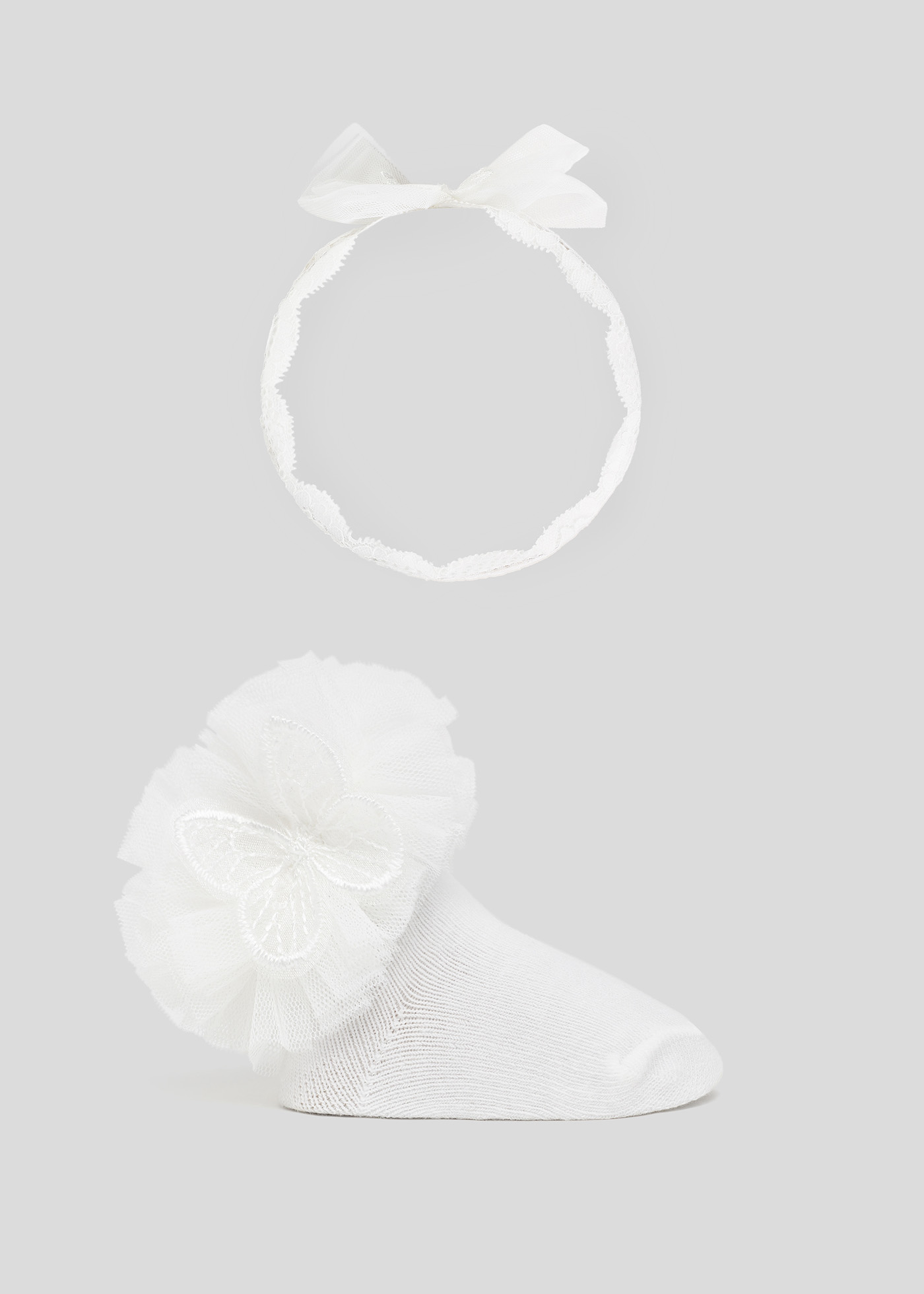Calcetines blancos de bebé de rizo 5350601